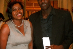 7 Scholarship Recipient with Presenter at Caribbean Educators Association Annual Scholarship Awards 2012