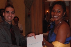 9 Scholarship Recipient with Presenter at Caribbean Educators Association Annual Scholarship Awards 2012